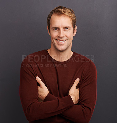 Buy stock photo Creative, man and happy portrait in studio for business with consultant or art director on dark background. Person, relax and professional with confidence for work or pride from fashion in mockup