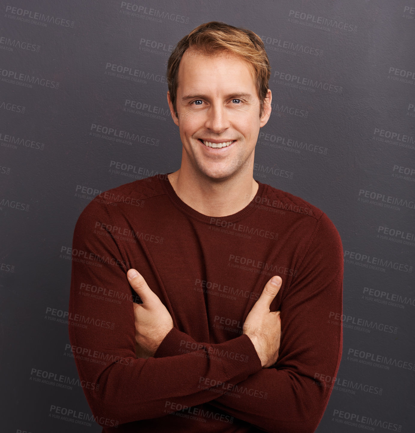 Buy stock photo Creative, man and happy portrait in studio for business with consultant or art director on dark background. Person, relax and professional with confidence for work or pride from fashion in mockup