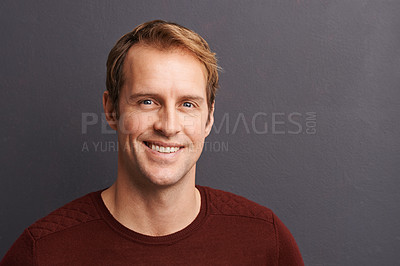 Buy stock photo A studio portrait of a handsome man in a sweater