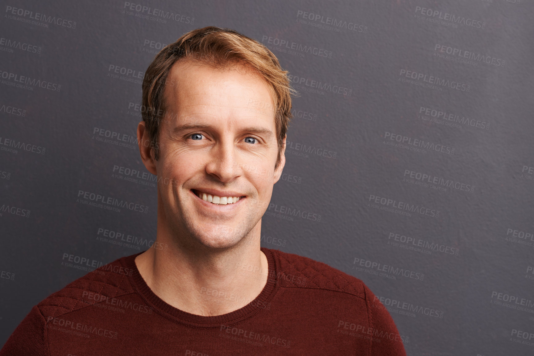 Buy stock photo A studio portrait of a handsome man in a sweater