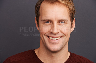 Buy stock photo Happy, man and portrait in studio for business with confidence and consultant on dark background. Person, relax and face closeup of professional in positive attitude for work or consulting in mockup