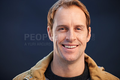 Buy stock photo Happy, portrait and man with fashion in studio for business with confidence and pride on dark background. Person, relax and face of guy with positive attitude in creative winter style in mockup