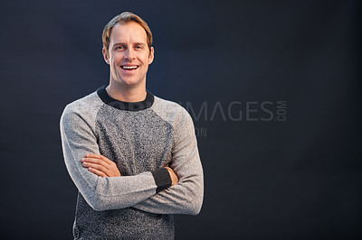Buy stock photo Portrait, smile and man with arms crossed, fashion and confident guy on a dark studio background. Face, person and model with casual outfit and trendy clothes with happiness, joyful and mockup space