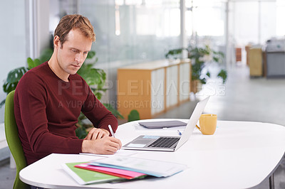 Buy stock photo Creative, office and business with man, writing or documents for a project or computer. Person, employee or copywriting with entrepreneur or planning with ideas or laptop with paperwork or schedule