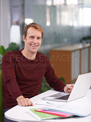 Buy stock photo Man, portrait and laptop research in office at creative agency as graphic designer for online project, paperwork or report. Male person, face and desk for business growth, entrepreneur or planning