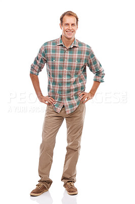 Buy stock photo Portrait of a handsome young man standing with his hands on his hips against a white background