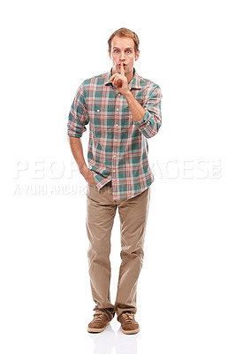 Buy stock photo Man, portrait and finger to lips for secret, mystery and whisper with gossip or drama on white background. Warning, caution and silent gesture, emoji and sign for quiet with confidential news