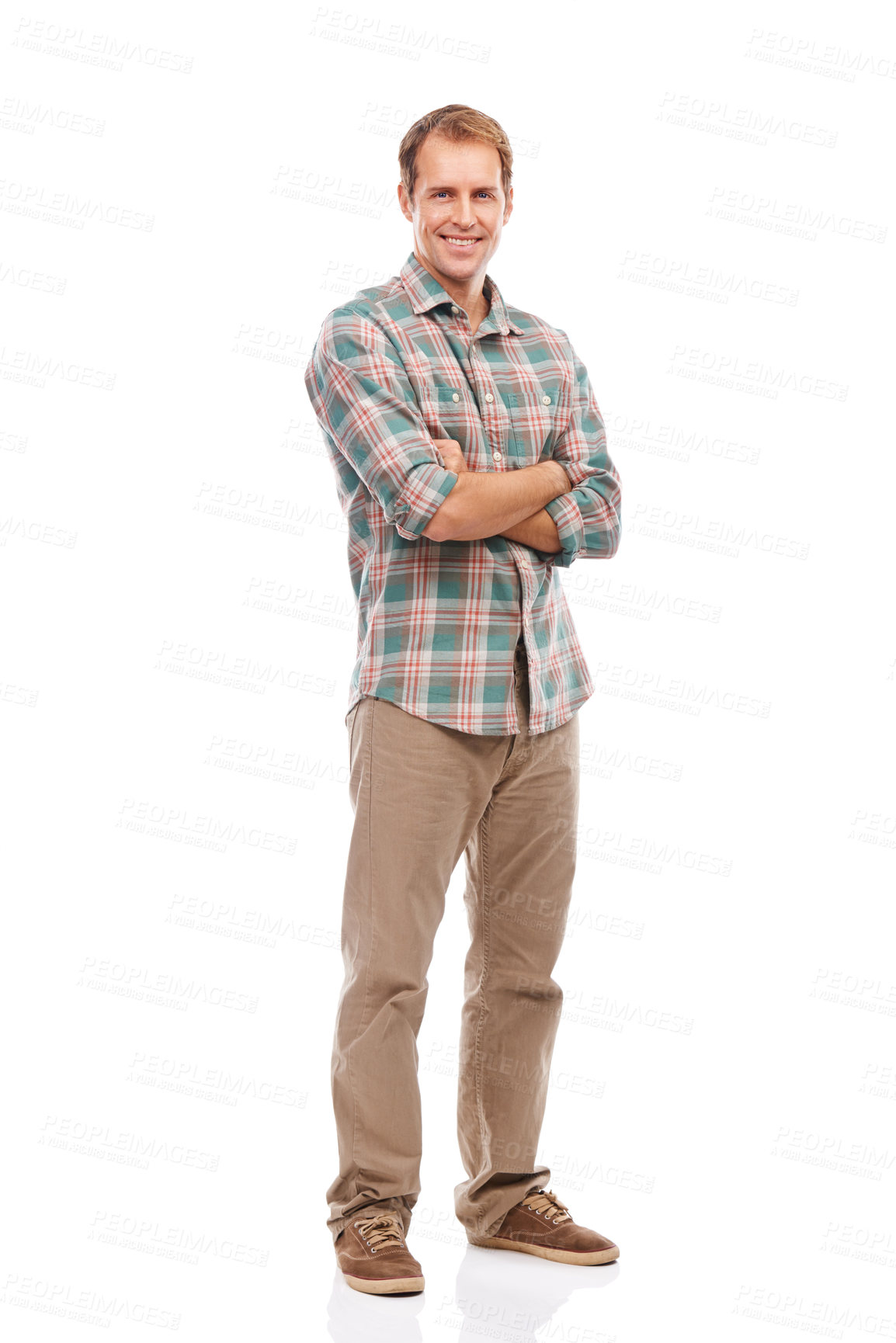 Buy stock photo Studio shot of a handsome young man posing against a white background