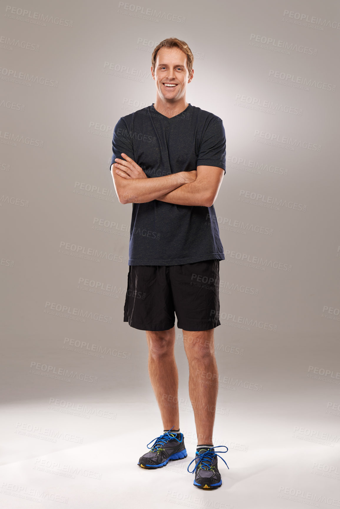 Buy stock photo Studio, portrait or athlete with arms crossed or fitness for running workout, exercise or health wellness. Grey background, proud runner or sports man ready to start training with confidence or smile