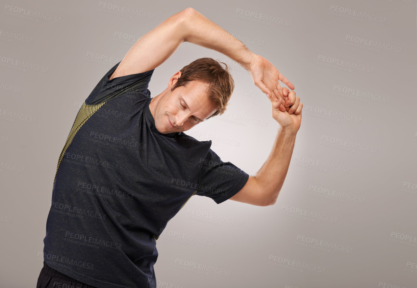 Buy stock photo Man, fitness or workout of stretching, flexibility or training as exercise, self care or strength. Runner, athletic person or sportsman in muscle, mobility or warm-up in studio on grey background