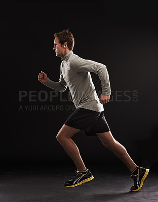 Buy stock photo Headphones, profile or man running in studio for training, cardio exercise or workout for health wellness. Side view, fitness or sports athlete on black background to jog with radio, music or podcast