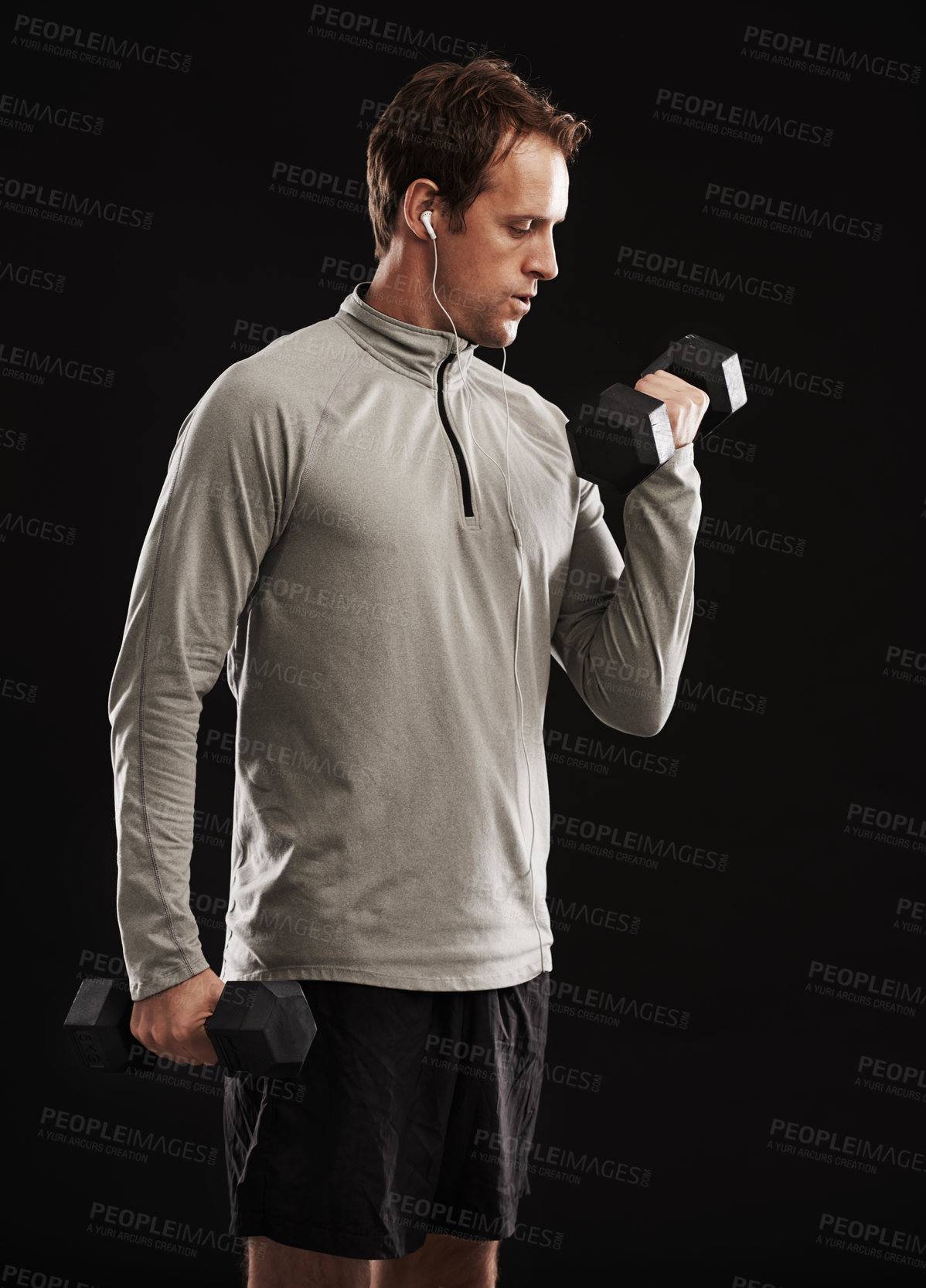 Buy stock photo Studio shot of a handsome young man in sportswear