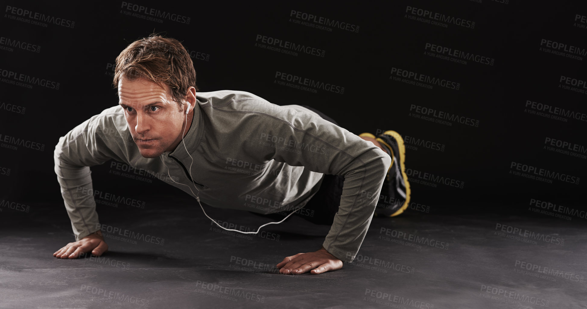 Buy stock photo Studio shot of a handsome young man in sportswear