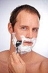 Shaving himself from a hairy situation