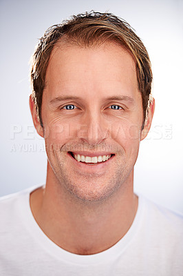 Buy stock photo Cropped studio shot of a smiling confident man