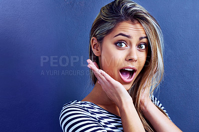 Buy stock photo Beauty, wow or surprised woman portrait in studio for hair, announcement or deal on blue background. Omg, face or model with emoji shock for salon giveaway, offer or cosmetic sale for blonde haircare