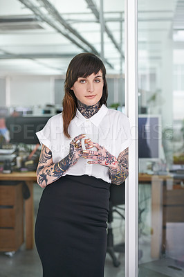 Buy stock photo Happy, tattoos and business woman with coffee in office with positive, good and confident. Grunge, cappuccino and portrait of professional edgy creative designer with ink skin standing in workplace.