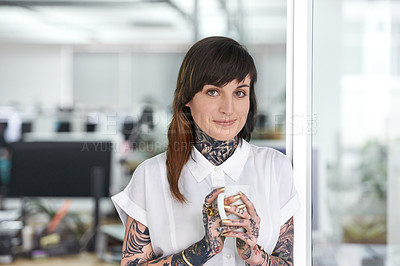 Buy stock photo Smile, tattoos and business woman with coffee in office with positive, good and confident. Grunge, cappuccino and portrait of professional edgy creative designer with ink skin standing in workplace.