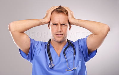 Buy stock photo Doctor, studio and headache for migraine, worry or tension and stethoscope. Man, burnout or migraine for professional, medic and health care or medical pressure and overworked on white background