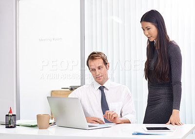 Buy stock photo Office, man and woman at laptop for advice, teamwork and planning for online startup review at desk. Computer, website and business people with consulting, partnership and professional collaboration