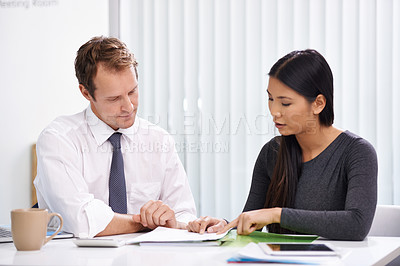 Buy stock photo Business people, teamwork and meeting with documents in office for financial feedback and corporate strategy. Man, woman and collaboration with communication, paperwork and planning with discussion