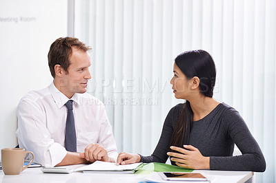 Buy stock photo Business people, collaboration and discussion with documents in office for financial feedback and corporate strategy. Man, woman and teamwork with communication, paperwork and planning in meeting