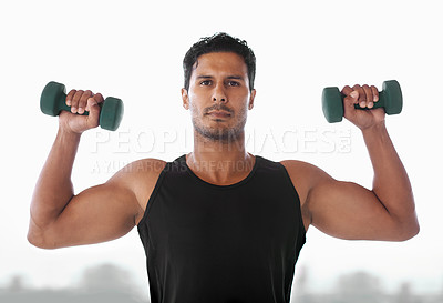 Buy stock photo Portrait, dumbbell and serious man outdoor for exercise, training and sports to workout for power. Bodybuilder, face or strong person weightlifting for fitness, health or wellness in nature in Brazil