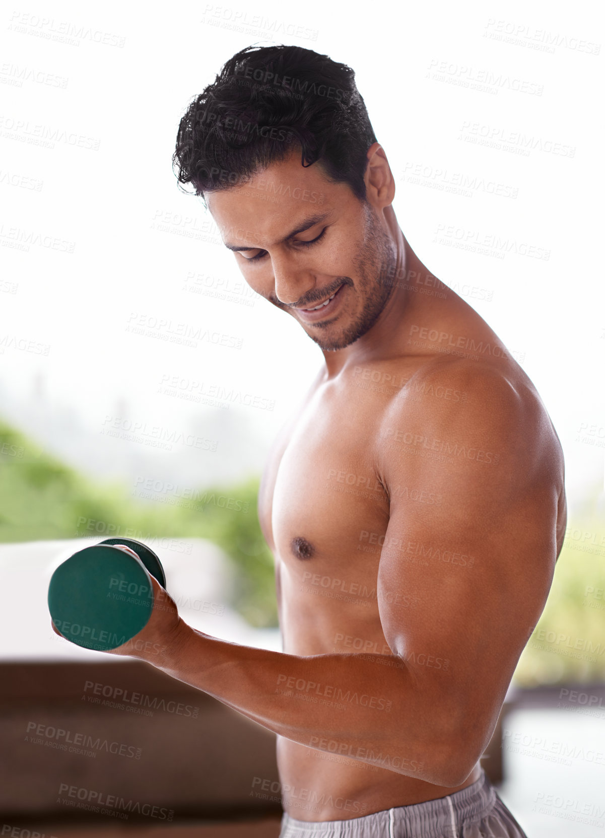 Buy stock photo Muscle, dumbbell and happy man outdoor for training, exercise and sports to workout for power. Bodybuilder, strong and topless person weightlifting for fitness, health or wellness with abs in nature