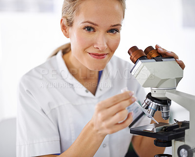 Buy stock photo Woman, portrait and rmedical research scientist with microscope for exam or scientific discovery at laboratory. Face of female person or expert with smile and scope for breakthrough or biology