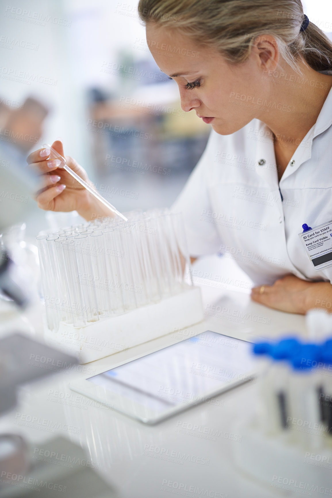 Buy stock photo Woman, scientist and vial with test for exam, research or discovery at the laboratory. Female person or medical professional in science experiment with pipette for chemical compound or DNA study