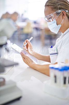 Buy stock photo Woman, scientist and writing with documents for experiment, test or exam in laboratory research or discovery. Female person or medical professional takings notes with mask for examination results
