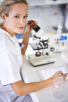 Buy stock photo Medical, woman and research with tablet and microscope in lab with development in biotechnology. Scientist, writing or check notes on pharmaceutical report or review data of innovation in science
