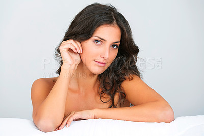 Buy stock photo Wake up, portrait and woman on a bed with morning beauty, wellness and natural cosmetics in her home. Face, smile and female person relax in a bedroom with glowing skin confidence, comfort or peace