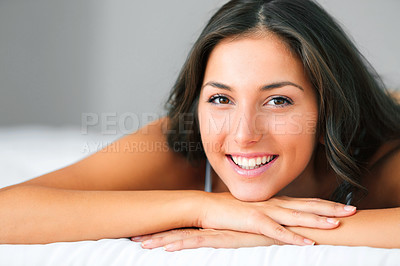 Buy stock photo Portrait, wake up and happy woman on a bed with morning beauty, wellness and natural cosmetics at home. Face, smile and female person relax in a bedroom with glowing skin confidence, comfort or peace
