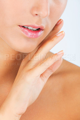 Buy stock photo Face, lips and hand with woman touching skin for dermatology, beauty and moisturizer isolated on white background. Facial, balm for mouth with shine and cosmetic care, wellness and skincare in studio