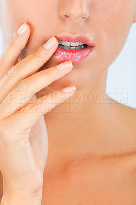 Buy stock photo Face, lips and woman with hand on skin for dermatology, beauty and moisturizer with manicure on white background. Facial, balm for mouth with shine and cosmetic care, wellness and skincare in studio