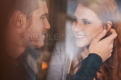 Buy stock photo Happy couple, love and support with affection at cafe for romance or care together at indoor restaurant. Face of man and woman with smile for date, relationship or romantic bonding at coffee shop
