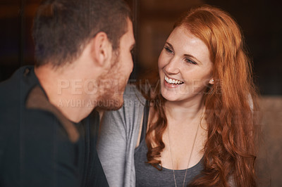 Buy stock photo Happy couple, bonding and laughing with funny joke at cafe for romance, support or romance at indoor restaurant. Man and woman with smile in happiness for social, conversation or friendly discussion