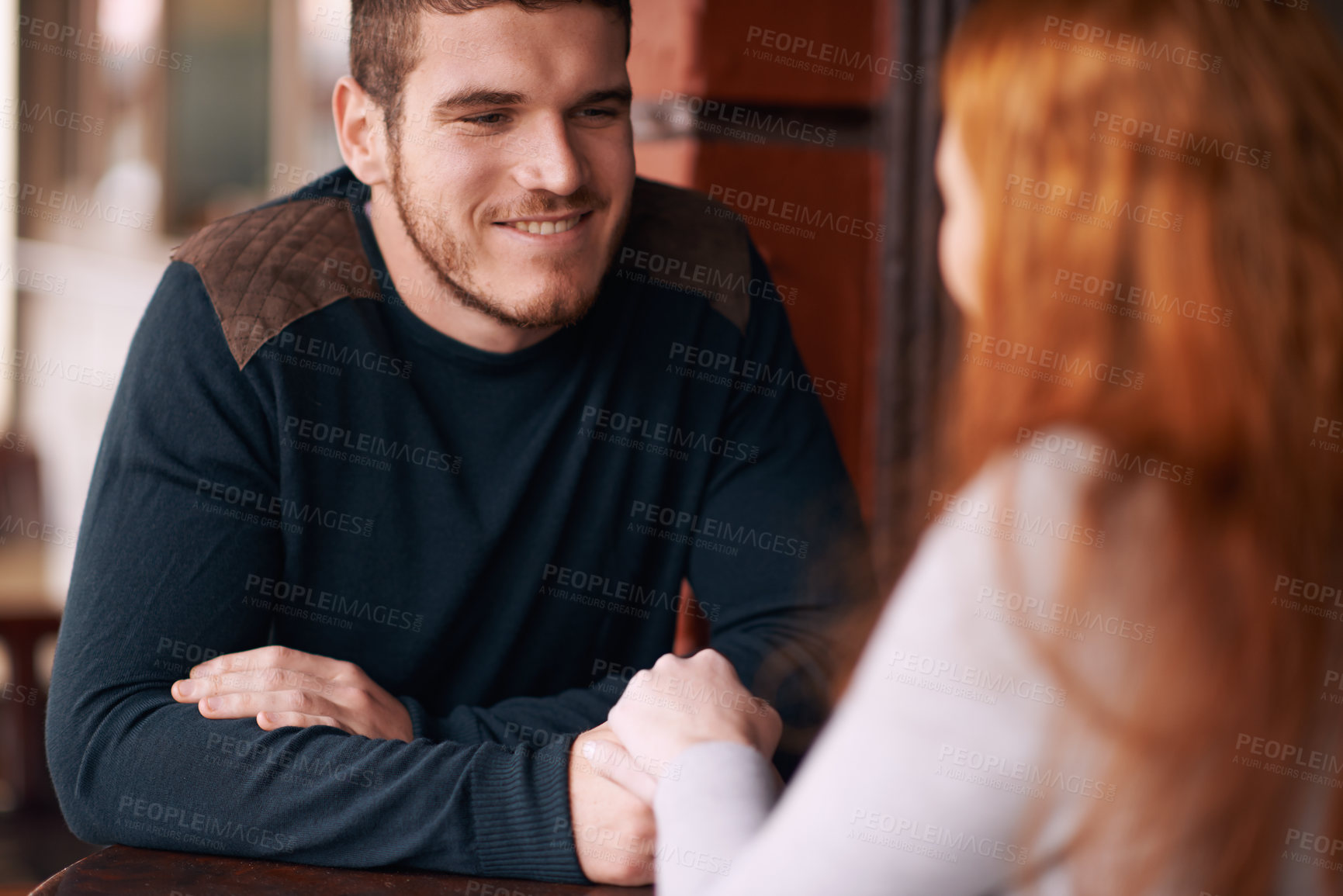 Buy stock photo Couple, man and happiness with holding hands at cafe for bonding, romance or healthy relationship with relax. Date, woman or affection at coffee shop with smile, trust or love on anniversary vacation