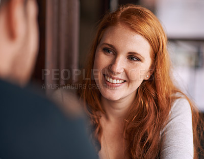 Buy stock photo Shot of an attractive female smiling at her date