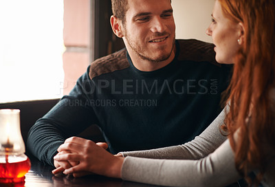 Buy stock photo Couple, smile and holding hands on date at cafe for bonding, romance and healthy relationship with relax. Man, woman and affection at coffee shop with happiness, trust or love on anniversary vacation