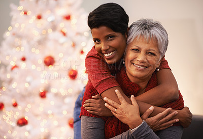 Buy stock photo Elderly mother, daughter and hug on Christmas in portrait, happiness with gratitude and love to celebrate holiday. Trust, support and care with women at xmas party in the home, family and bonding