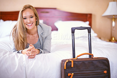 Buy stock photo Portrait of a beautiful businesswoman relaxing in a hotel room