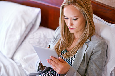 Buy stock photo Business woman, tablet and hotel room with travel and reading for attorney case with brief. Technology, bed and hospitality with digital, web reading and planning of a law professional on a trip