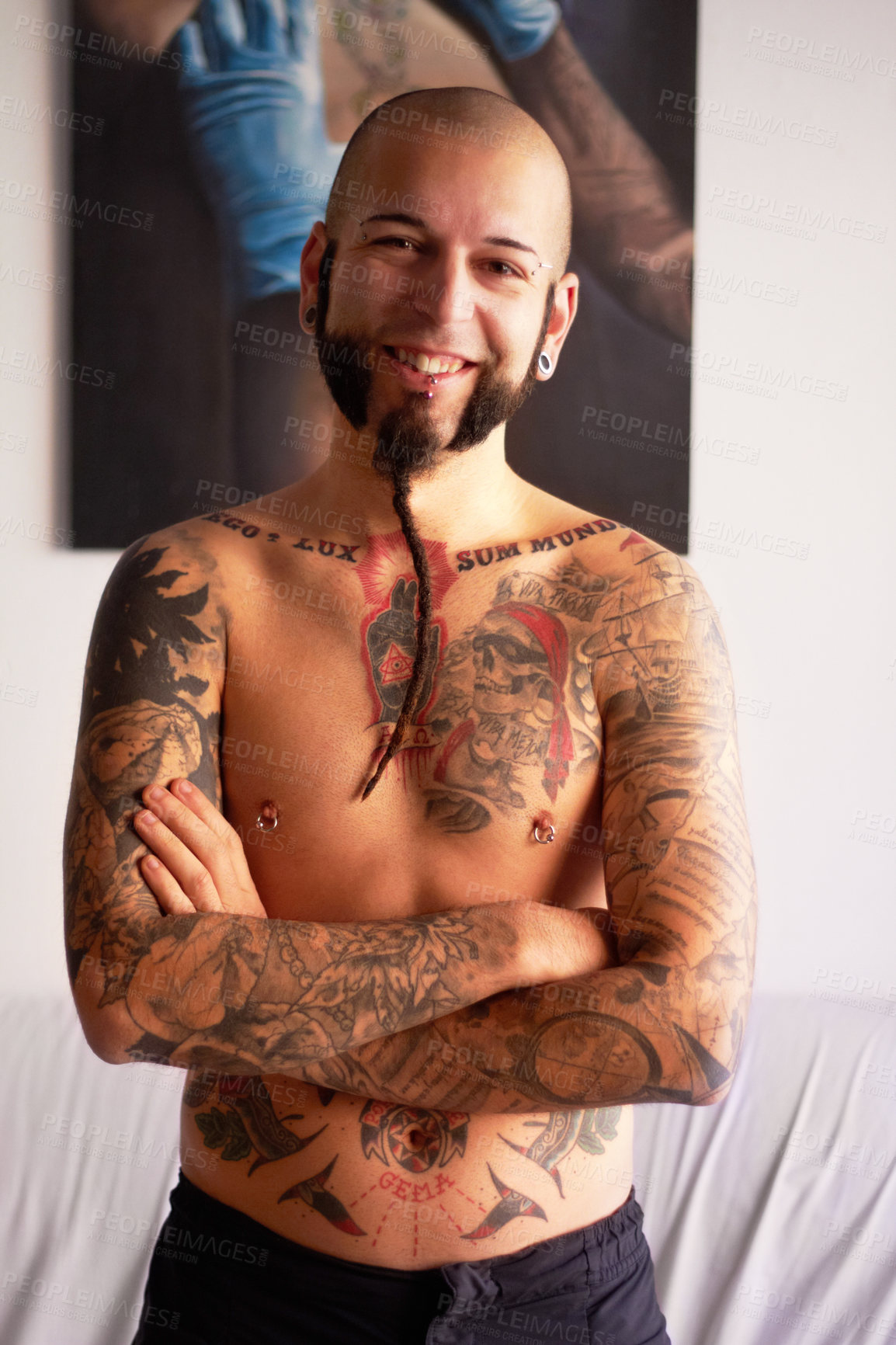 Buy stock photo Happy, arms crossed and portrait of a man with tattoos, pride and happiness in a house. Smile, confidence and a person with body ink, creativity and punk identity in a living room in the morning