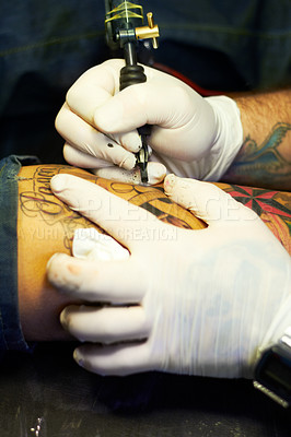 Buy stock photo Creative, art and tattoo with closeup of person and machine in store for ink graphic, culture and drawing. Design, punk and identity with hand of artist in salon for picture, painting and pattern