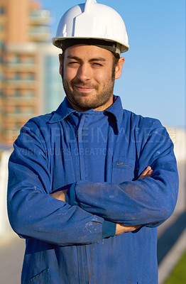 Buy stock photo Man, architect and portrait smile in construction with arms crossed and hard hat in the city. Male person, engineer or contractor smiling in confidence for industrial architecture or building in town