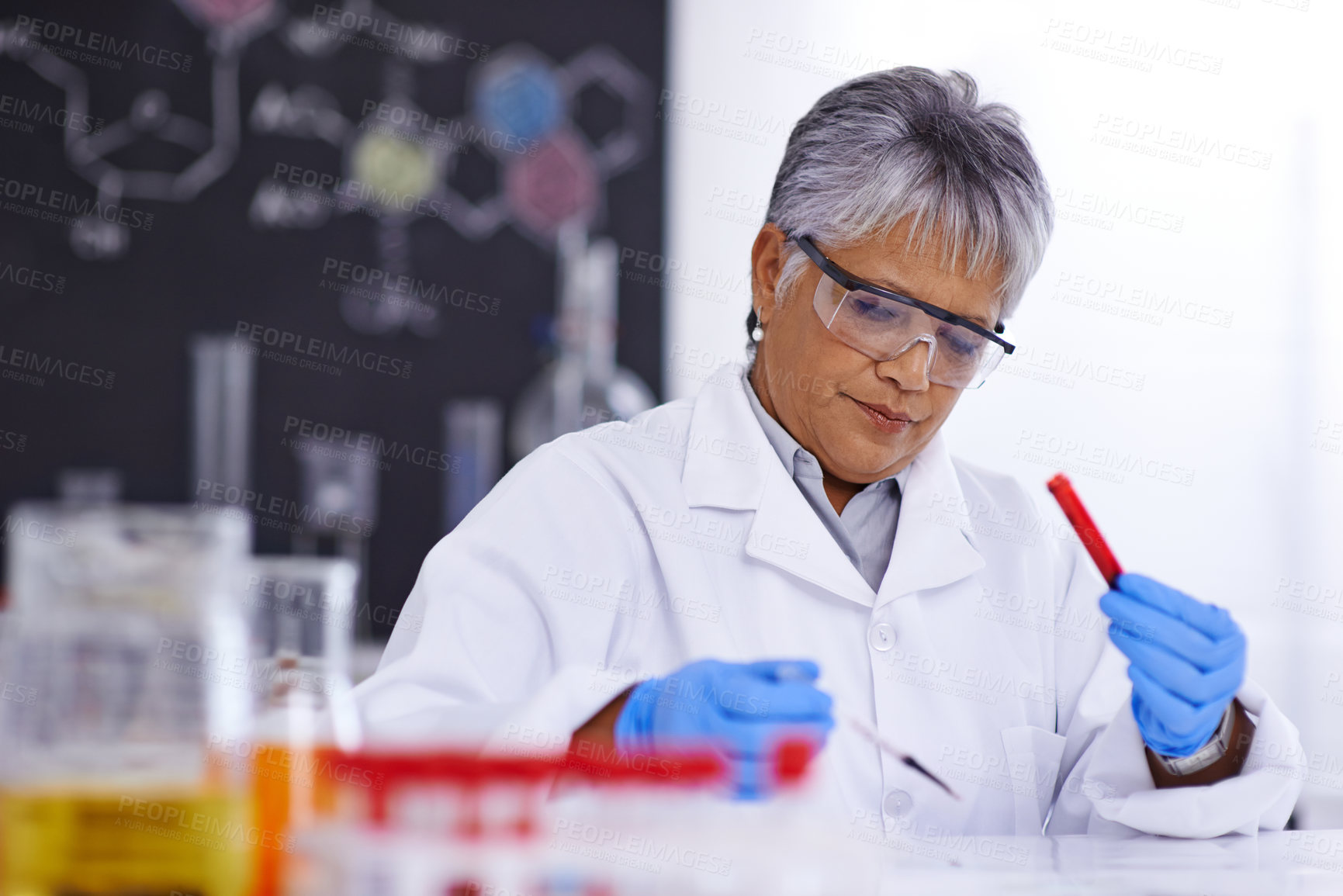 Buy stock photo Science, blood sample and senior woman in laboratory for medical analysis, research and study. Healthcare, biotechnology and scientist with test tube for vaccine development, experiment and medicine