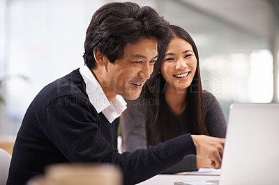 Buy stock photo Laptop, asian business people and happy for collaboration on technology and online research on project. Japanese man, woman and working together in office for teamwork and web developer by computer