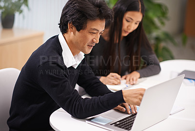 Buy stock photo Laptop, asian business people and technology for teamwork on internet and online research on project. Japanese man, woman and working together in office in collaboration and web developer by computer